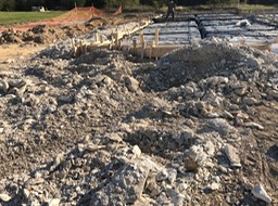 Bedrock and buried water line