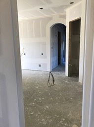 Hallway through Kitchen with Pantry